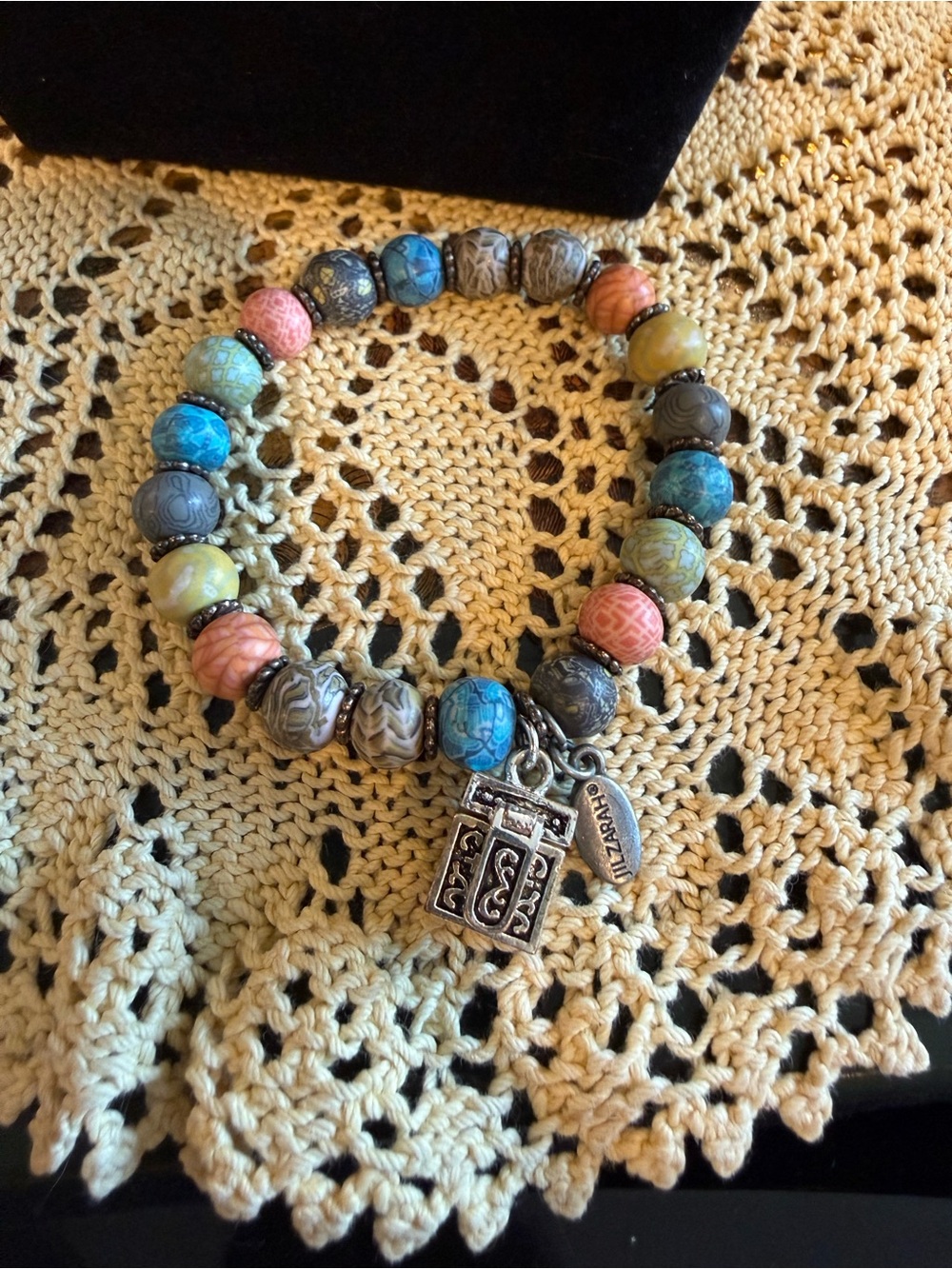 Multi-Color Beaded Charm Bracelet with Silver Accent Charm
